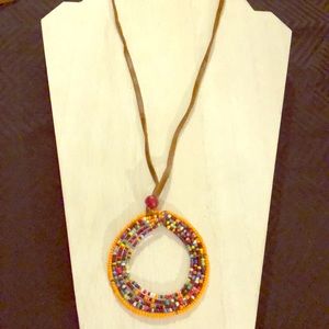 Muti colored pendent on necklace